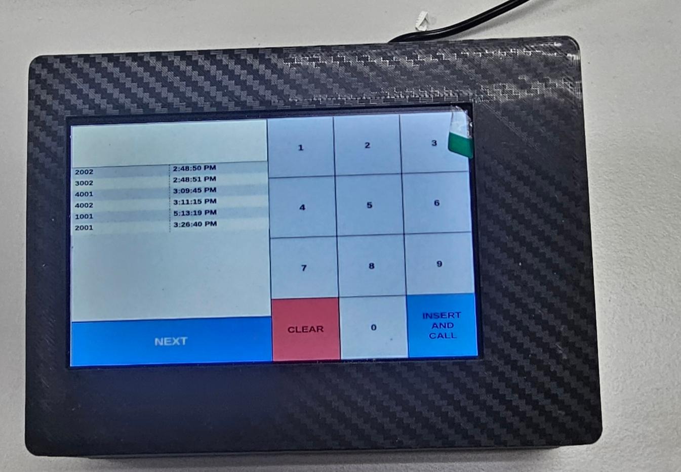 QCaller keypad device for calling the next queue number